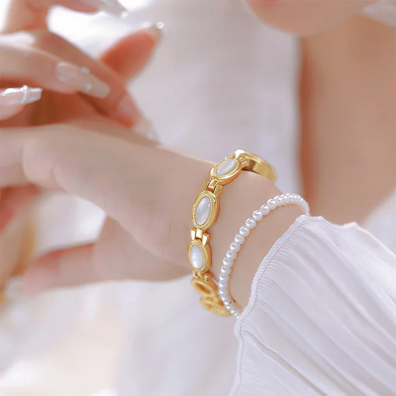 Elegant Vintage Women's Watches Gentle Temperament High-end Gold White Bracelet Clock Waterproof Oval Dial Quartz Ladies Watch