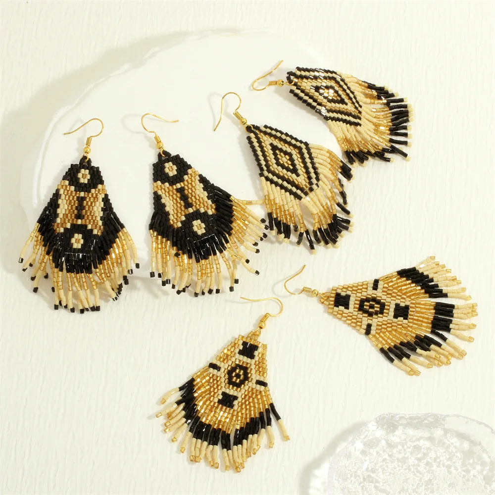 

Rice bead earrings Tassel Originality Butterfly Design Geometry Hand knitting Bohemia Alloy Fashion Simple Beaded earrings