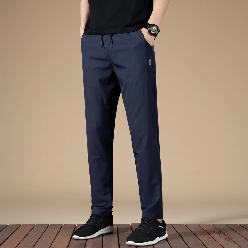 

Men's Spring Autumn Solid Bandage Drawstring Elastic Pocket High Waist Casual Loose Sports Trousers Fashion Office Lady Pants