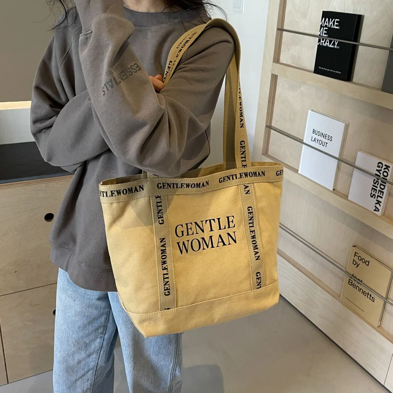 New Women's Large Capacity Letter Printed Canvas Shoulder Bag Casual Tote Bag Handheld Shopping Bag Fashionable Versatile