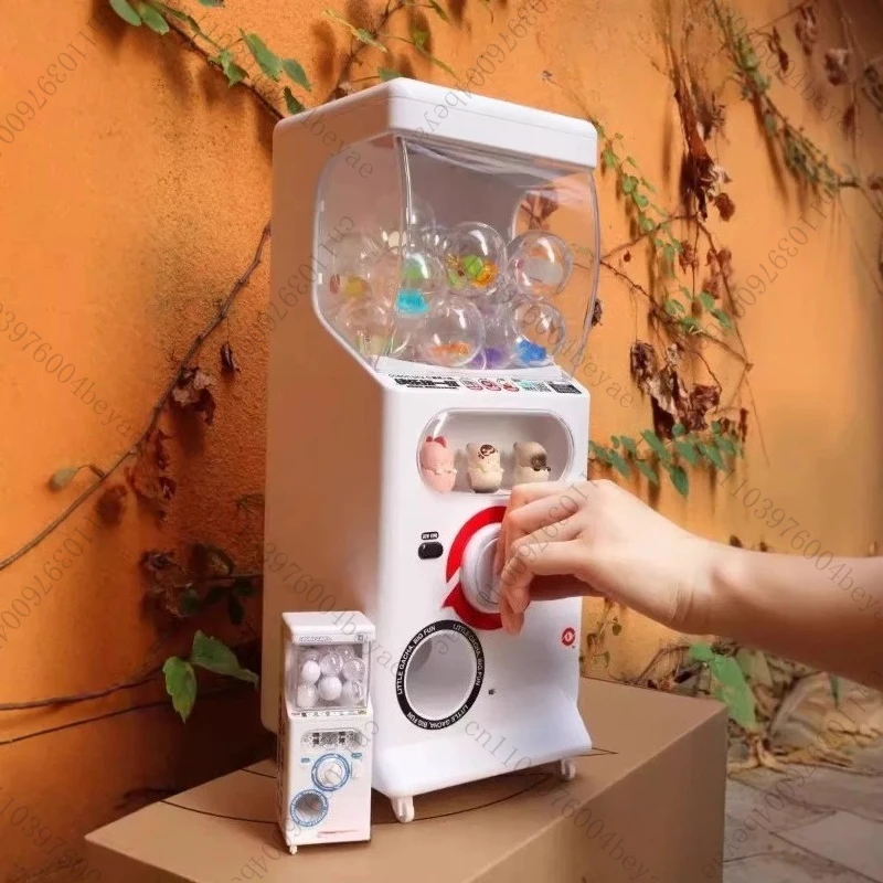 

Twisting egg machine, game machine, coin operated surprise, annual meeting, lottery machine, gift