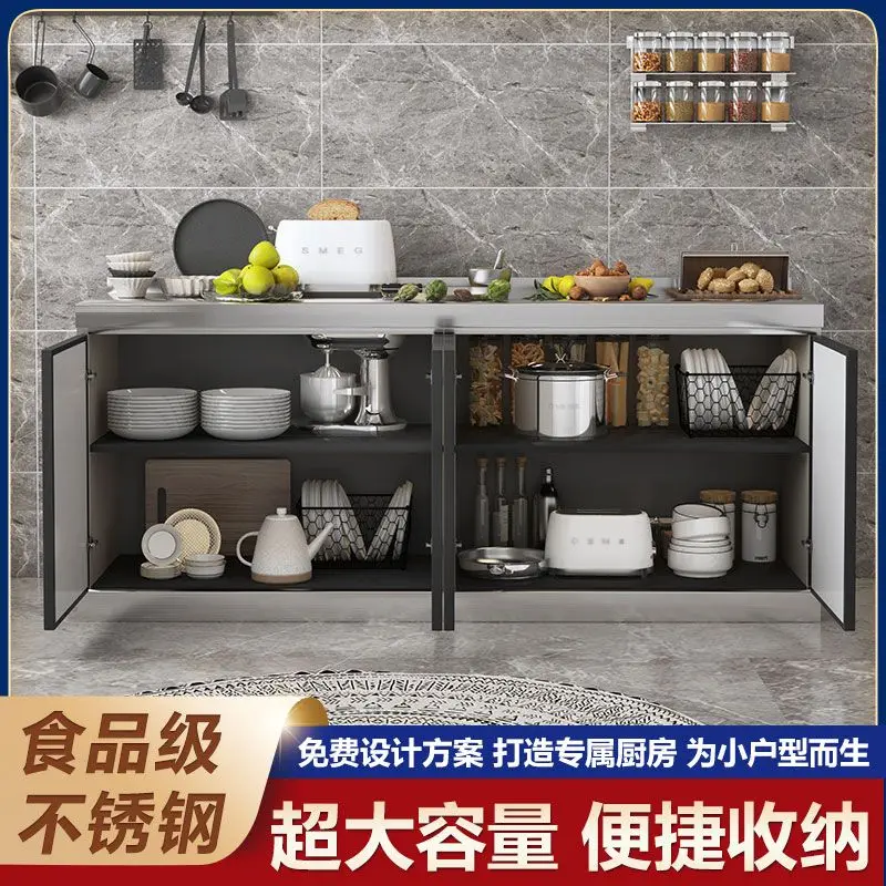 A simple kitchen with stainless steel cabinets and stove cabinets