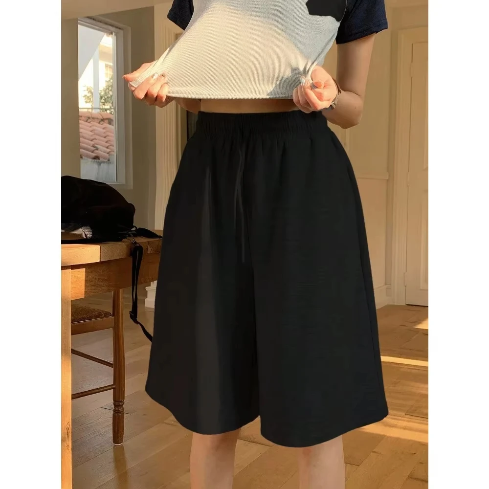 شورت نسائي كاجوال فضفاض للموسم بلون سادة وجيب مائل شورت رياضي من القطن الخالص ملابس الشارع الشهير سروال قصير للنساء