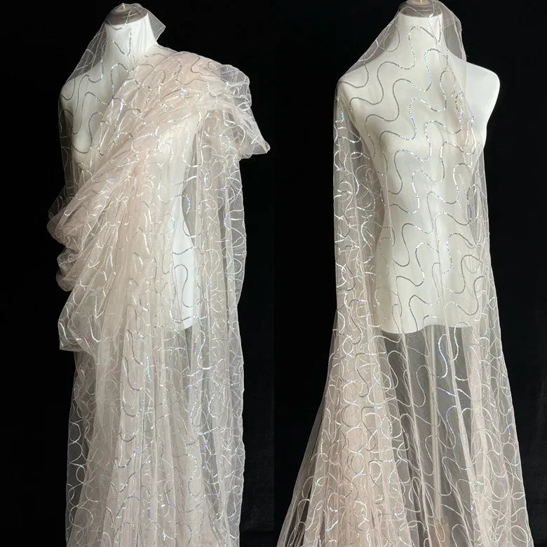 

New wave sequin mesh fabric, transparent laser sequin material for wedding dresses home decor designer fabrics