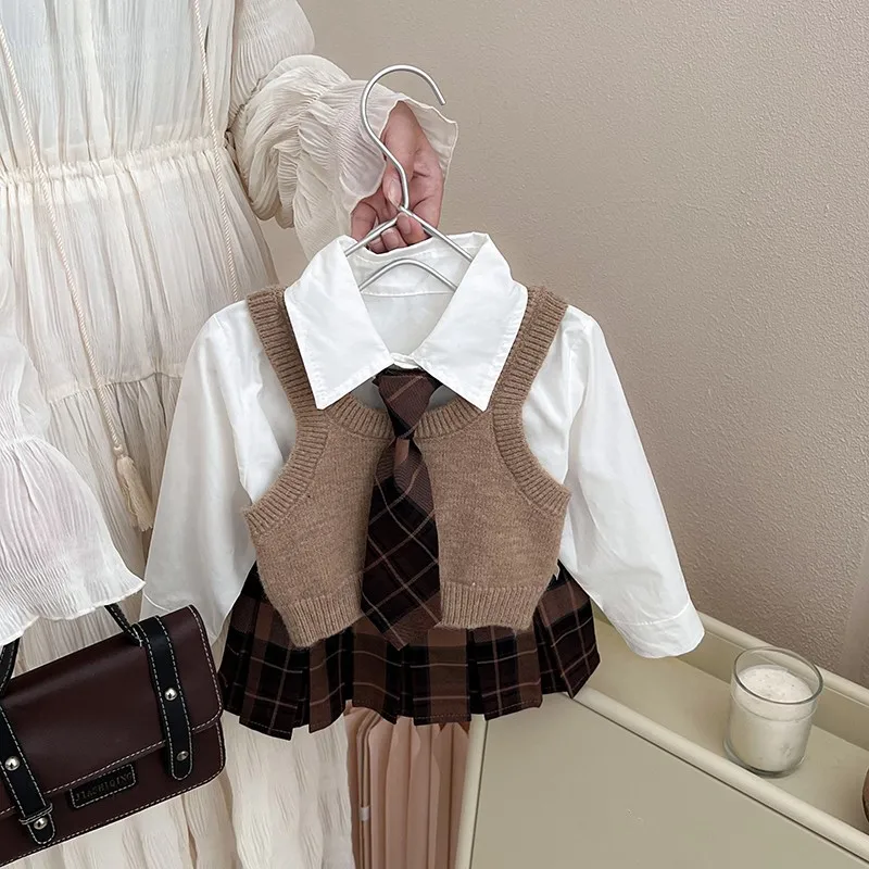 Dziewczęcy jesienny styl College JK garnitur nowy styl mody dziecięcej koszula kamizelka z dzianiny plisowana spódnica trzyczęściowy zestaw jednolite zestawy