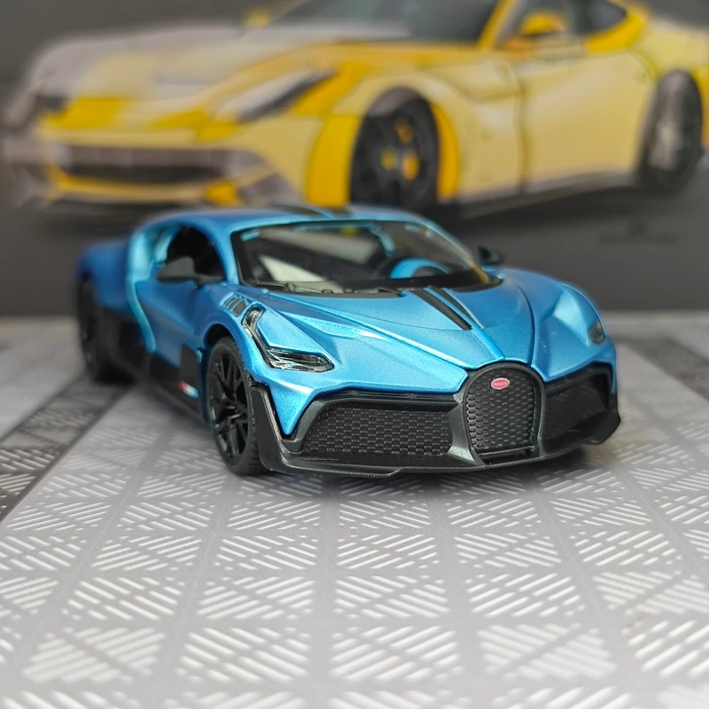 

Модель раллийного автомобиля Bugatti DIVO из сплава, масштаб 1:32, коллекционная модель, двери и капот открываются.