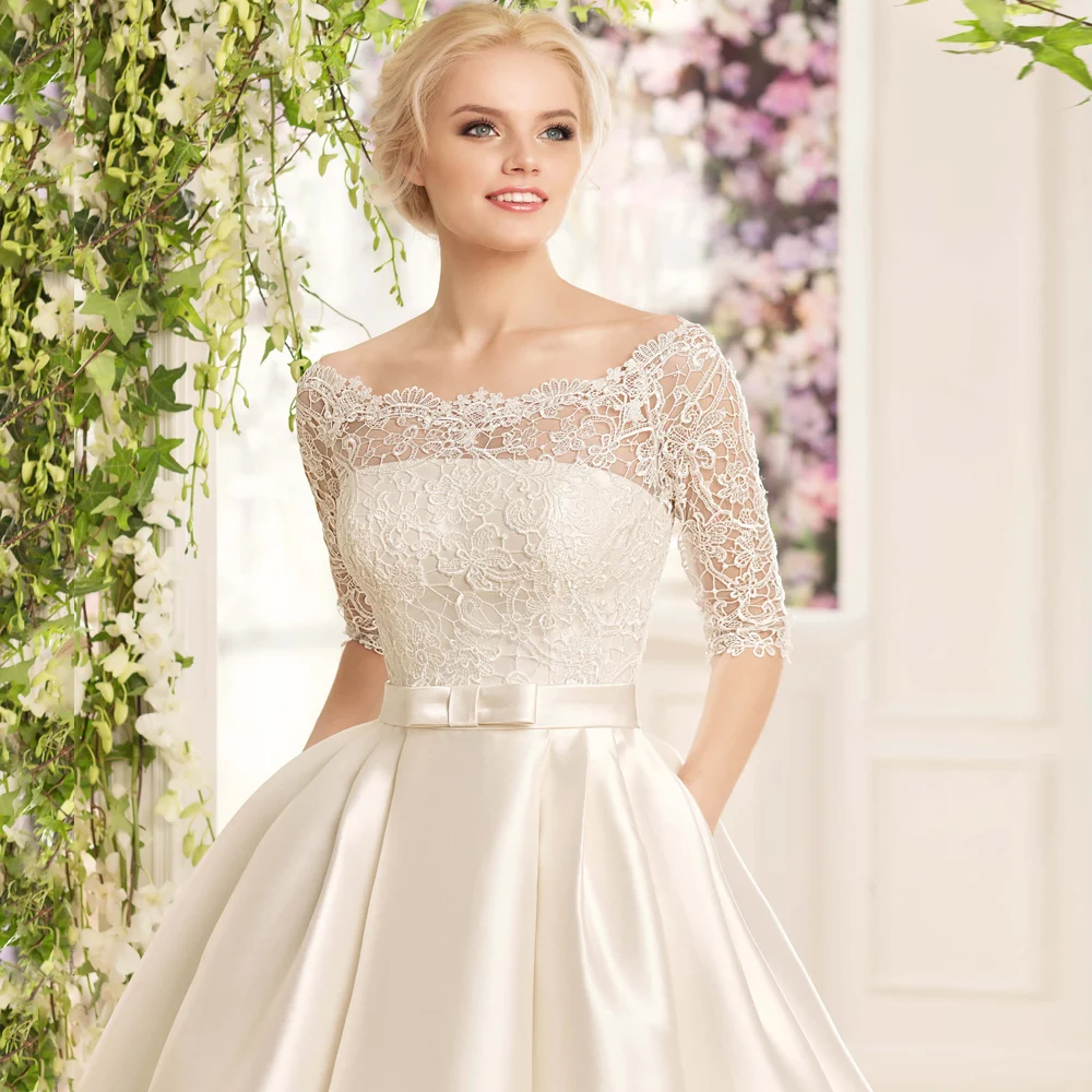 Robe de mariée A-Line Court-Train, robe de mariée en satin, col bateau, manches mi-longues, appliques en dentelle, classique, moderne, éducatif