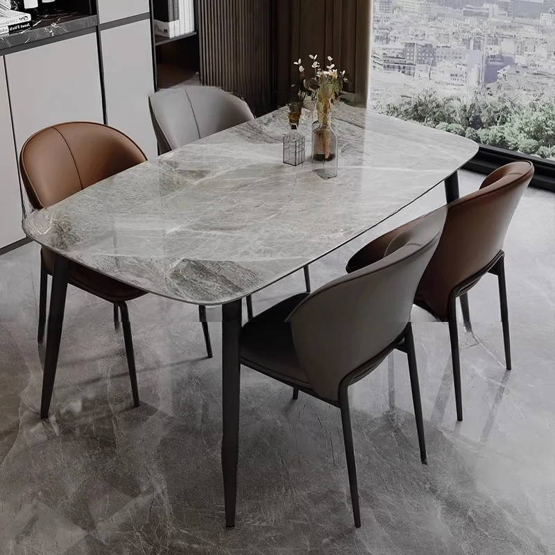 

Nordic Italian, light luxury high-end thickened, full support rock slab Internet celebrity dining table and chair combination