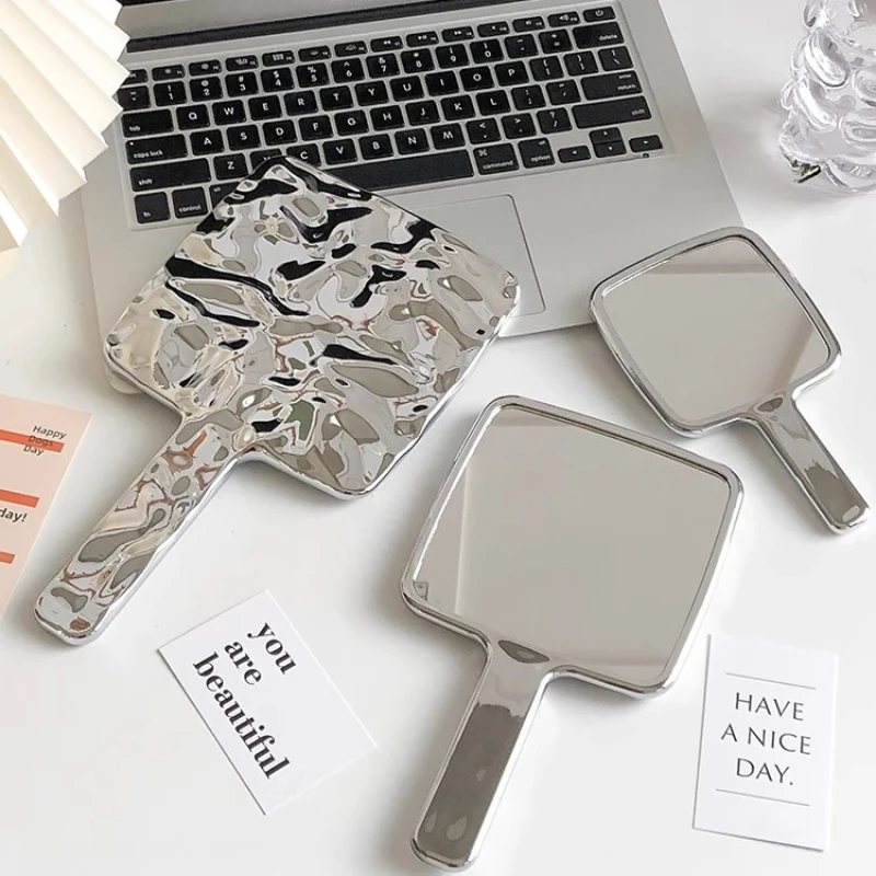 

Small Handled Mirror Girls Simple Design Compact Mirror Modern Portable Espejo Maquillaje Luz Home Decoration Accessories