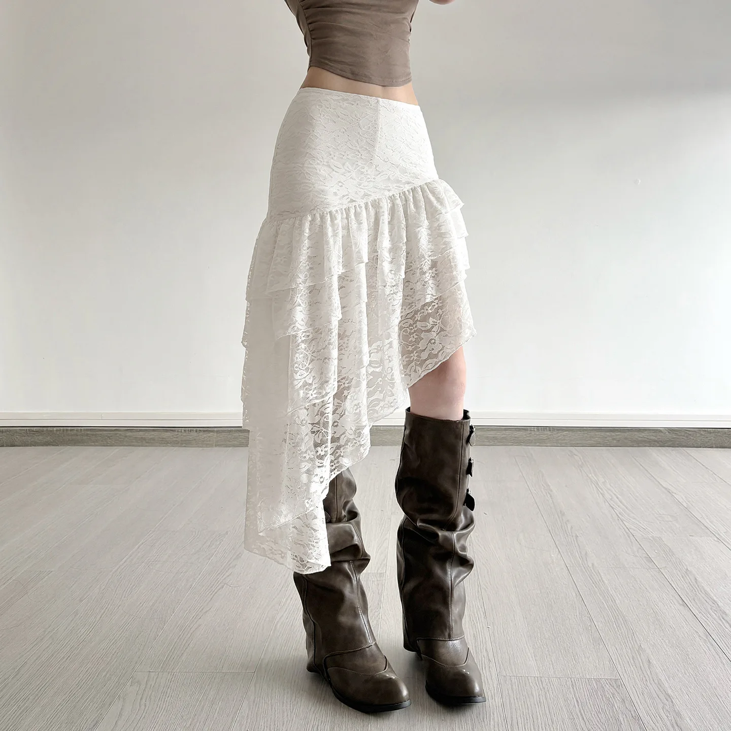 

Ins pure desire girl holiday wind lace layer by layer spell to receive irregular waist skirt female summer new style