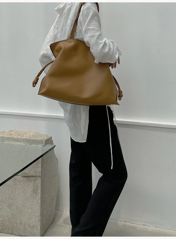 Cowhide drawstring blessing bag  new small commuter high-capacity soft leather tote bag pleated portable shoulder bag