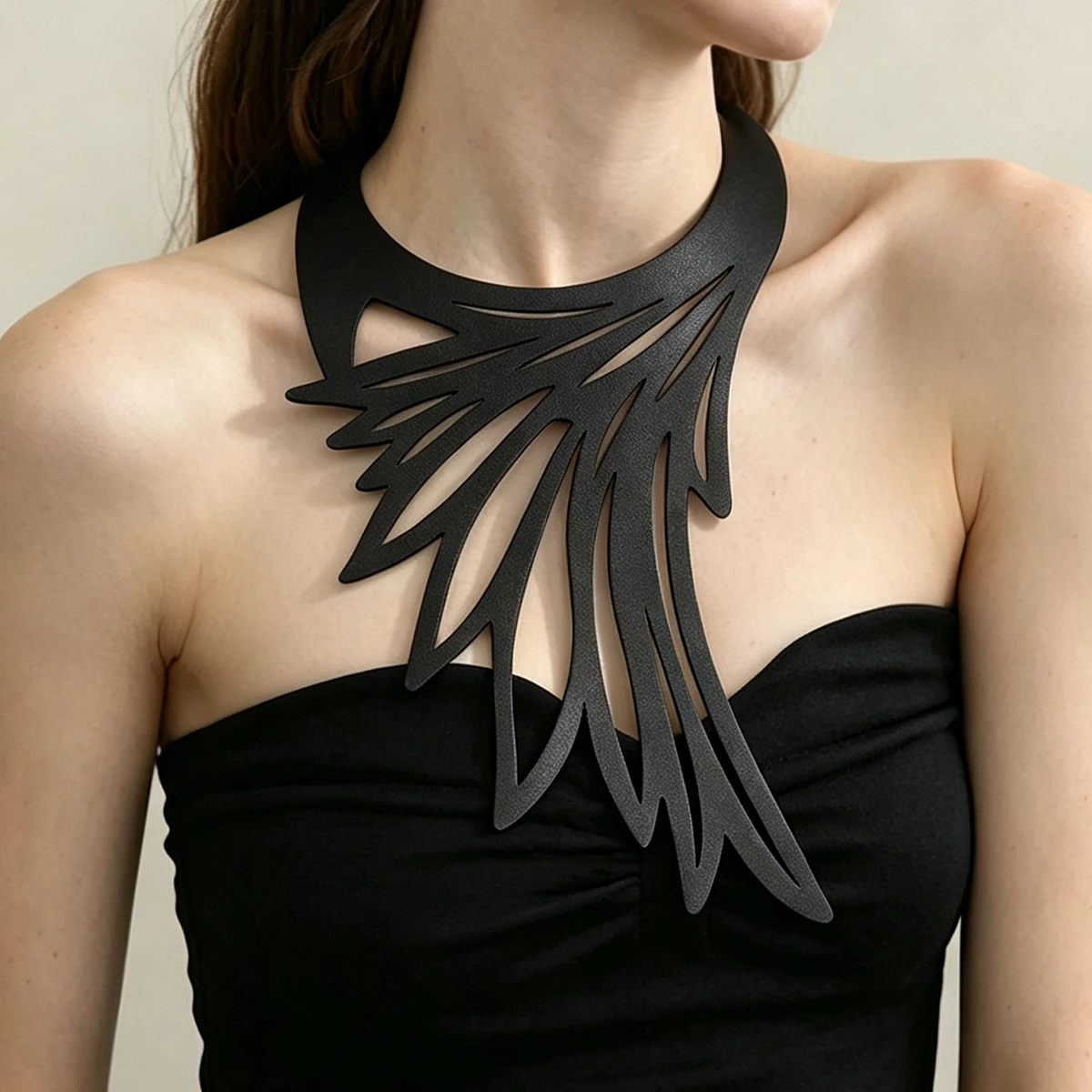 Marliwoo Asymmetric Feather Hollow‑out PU Leather Bib Necklace Statement Neck Ornament for Party Show Halloween Women Jewelry