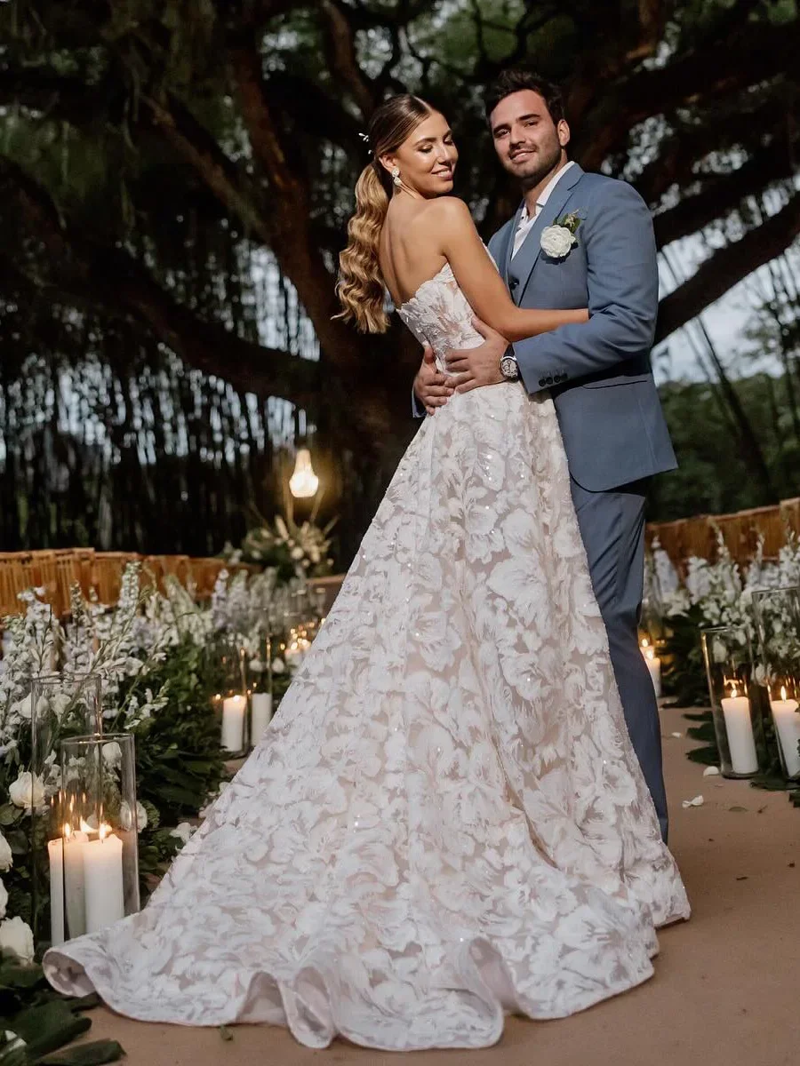 

Высококачественное свадебное платье без бретелек по индивидуальному заказу с потрясающими кружевными аппликациями и свадебным платьем трапециевидной формы с цветочным принтом