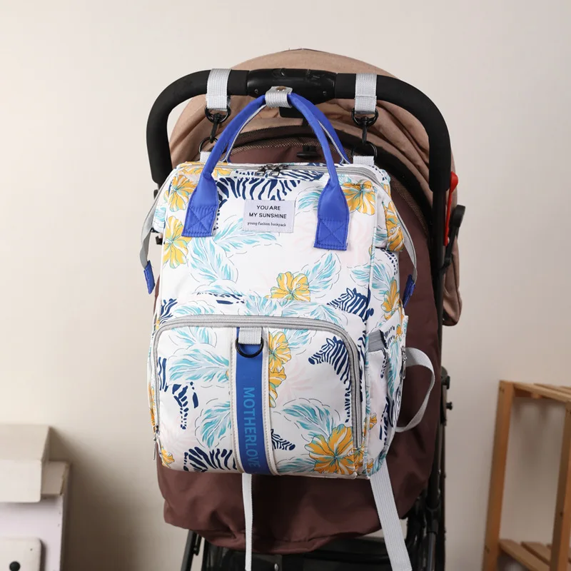 Bolso de viaje multifuncional para madre e hijo, mochila de gran capacidad, a la moda, con estampado