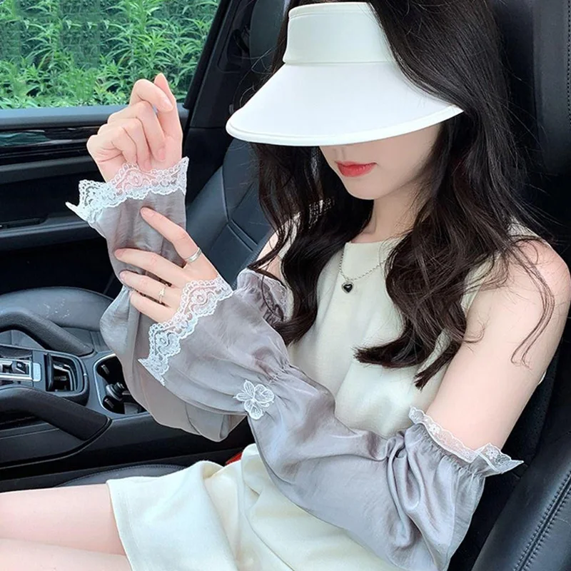 Maniche di protezione solare con fiocco in pizzo Donna Moda coreana Maniche larghe in seta di ghiaccio Estate Anti-UV Parasole Ciclismo Guida Manica lunga