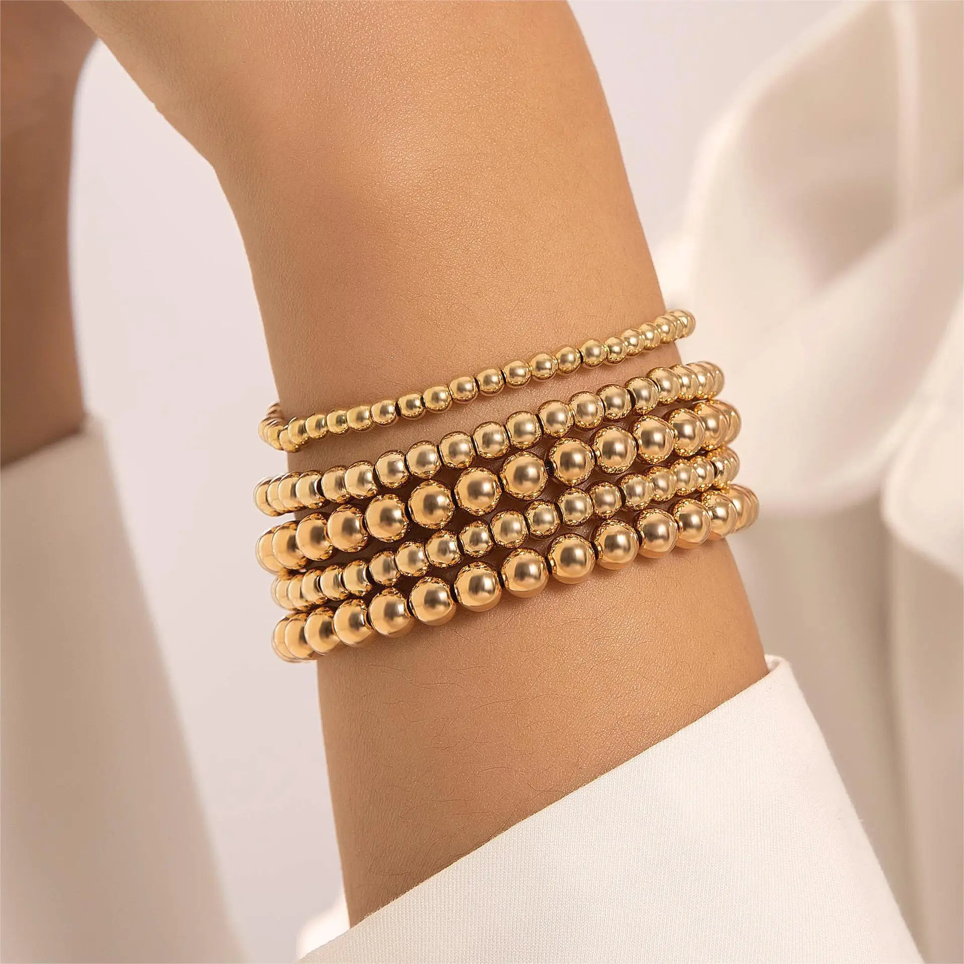 Bracciale Elastico con Perline Rotonde in Acciaio Inox Placcato Oro 2-10mm, Braccialetto Impilabile Unisex, Gioiello Versatile alla Moda