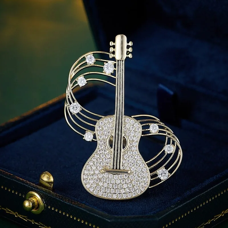 Niche design violin guitar brooch, light luxury zircon-encrusted clothing brooch, suit accessories, high-end corsage