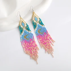Rice bead earrings Tassel Symmetry Sun Design Astral Moon Originality Hand knitting Bohemia Alloy Fashion Simple Beaded earrings