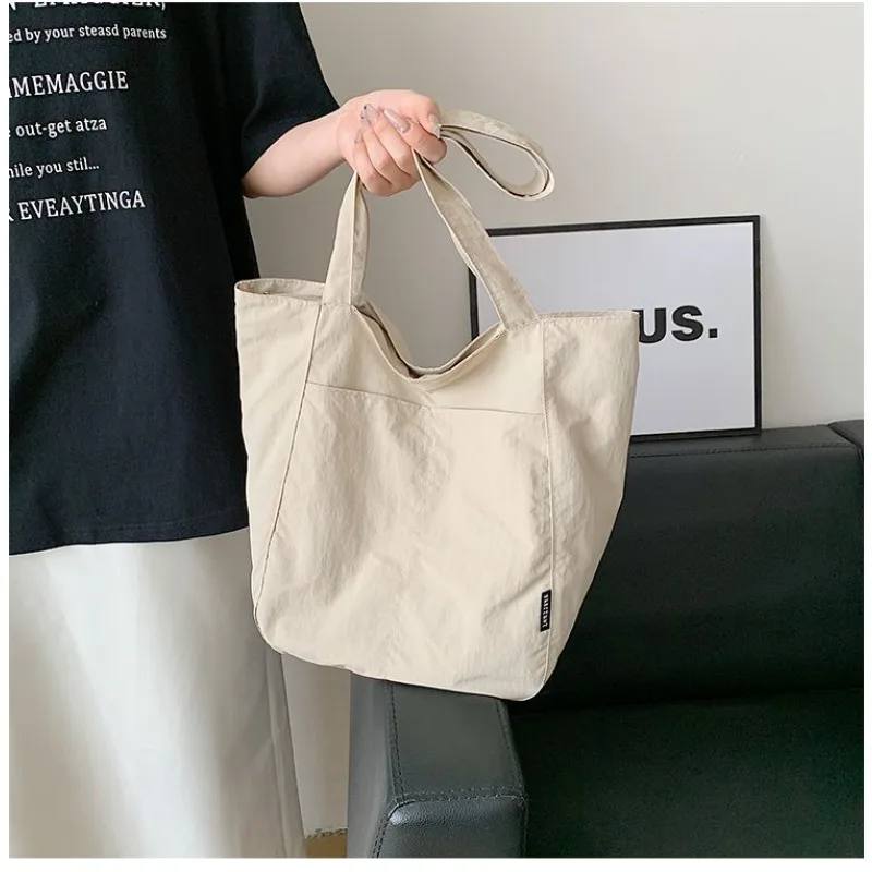 

simple Nylon bag female Large capacity Stylish casual lightweight shoulder bag Solid color All-in-one Student Commuter Tote bag