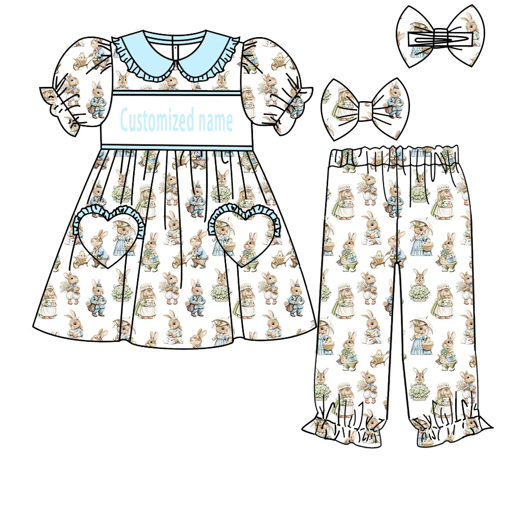 

Этот пижам для девочек на пасхальной тематике с принтом кролика и моркови, воротник с кружевной отделкой и кружевной отделкой в форме сердца на карманах.