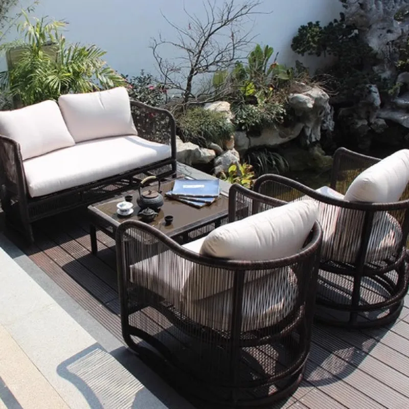 

Outdoor rattan sofa courtyard model room creative new Chinese imitation rattan sofa coffee table combination balcony
