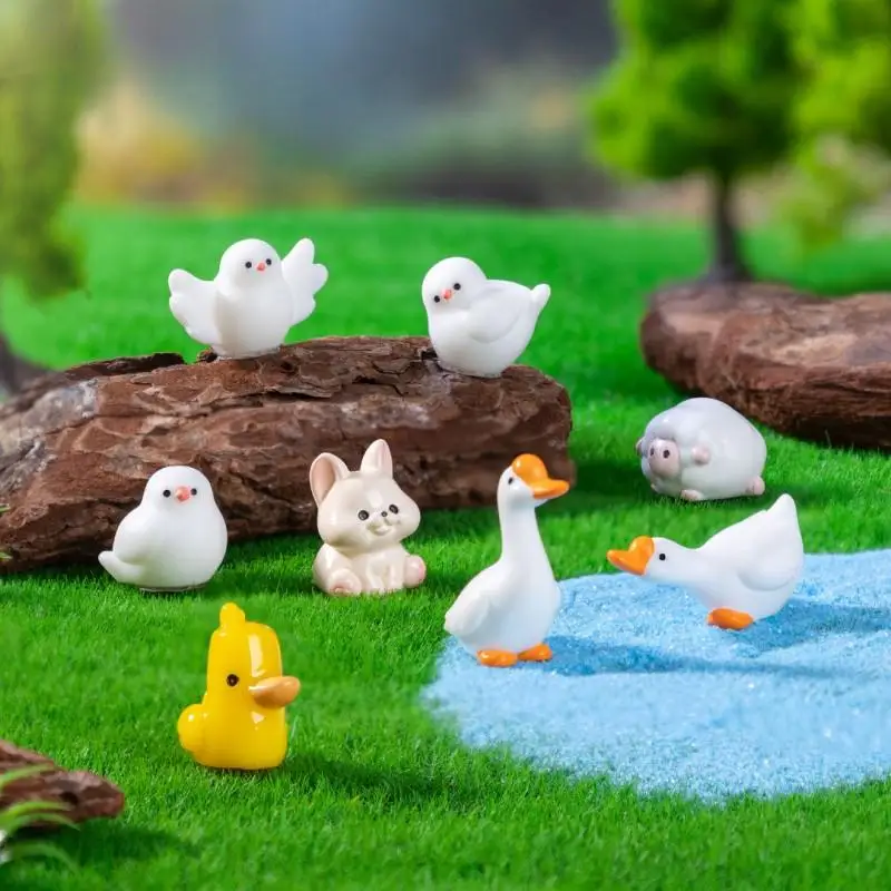 10-piece miniature landscape set featuring adorable sheep and goose plush toys, perfect for DIY gardening and landscaping.