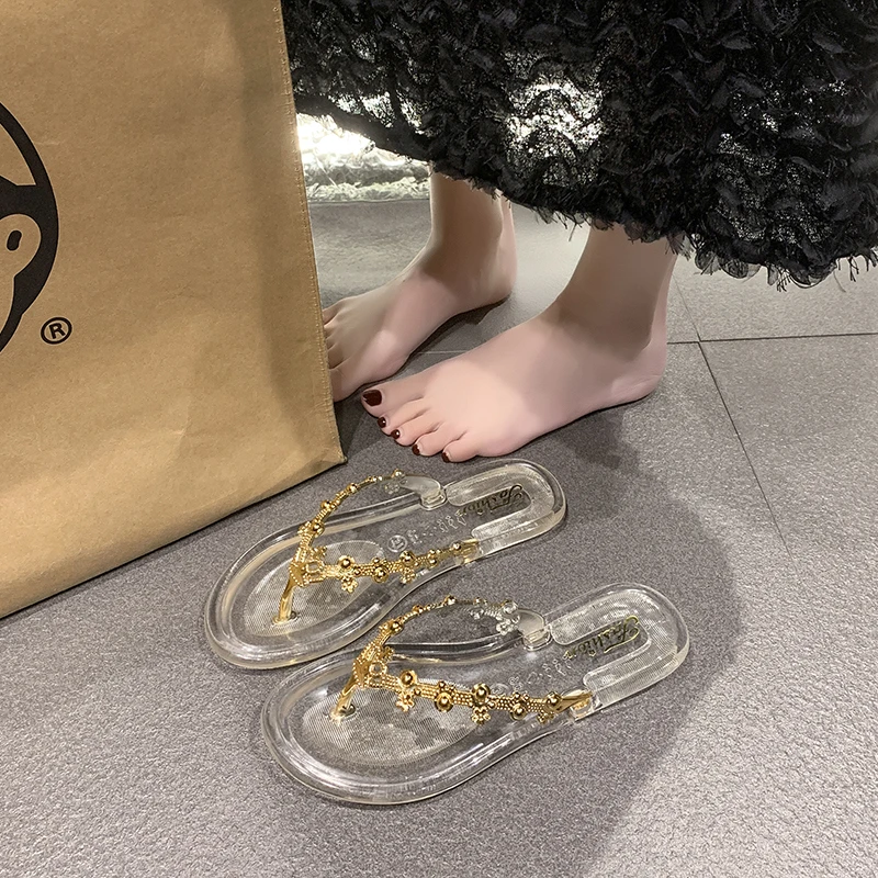 

Женские тапочки, летние модные повседневные прозрачные желеобразные металлические тапочки с декоративным зажимом на плоской подошве, уличные пляжные шлепанцы
