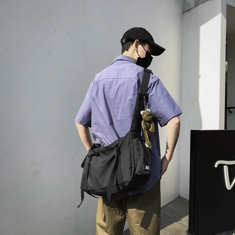 bolsa-crossbody-unissex-de-grandes-dimensoes-com-grande-capacidade-e-estilo-de-rua-bolsa-mensageiro-de-acabamento-gotico-bolsa-de-lona-masculina