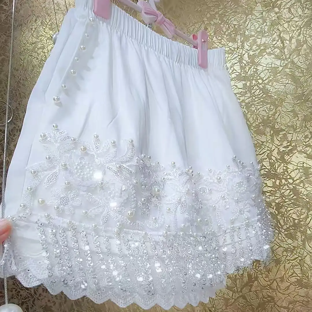 Novo em design de luxo high street y2k shorts brancos para mulheres 2025 verão quente curto cintura elástica calças curtas roupas femininas