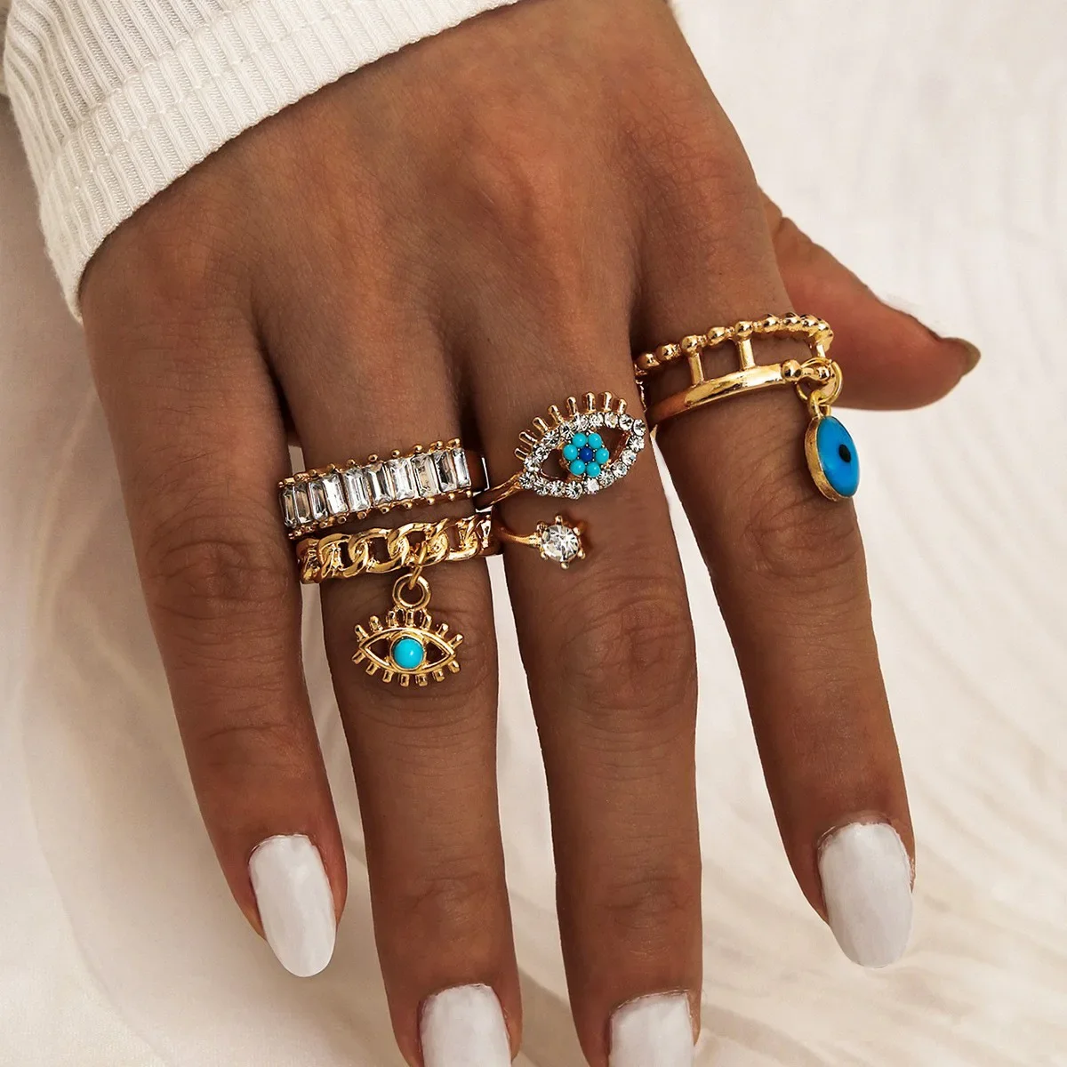 

New ring punk street style, devil's eye diamond drip hollow 4-piece ring set