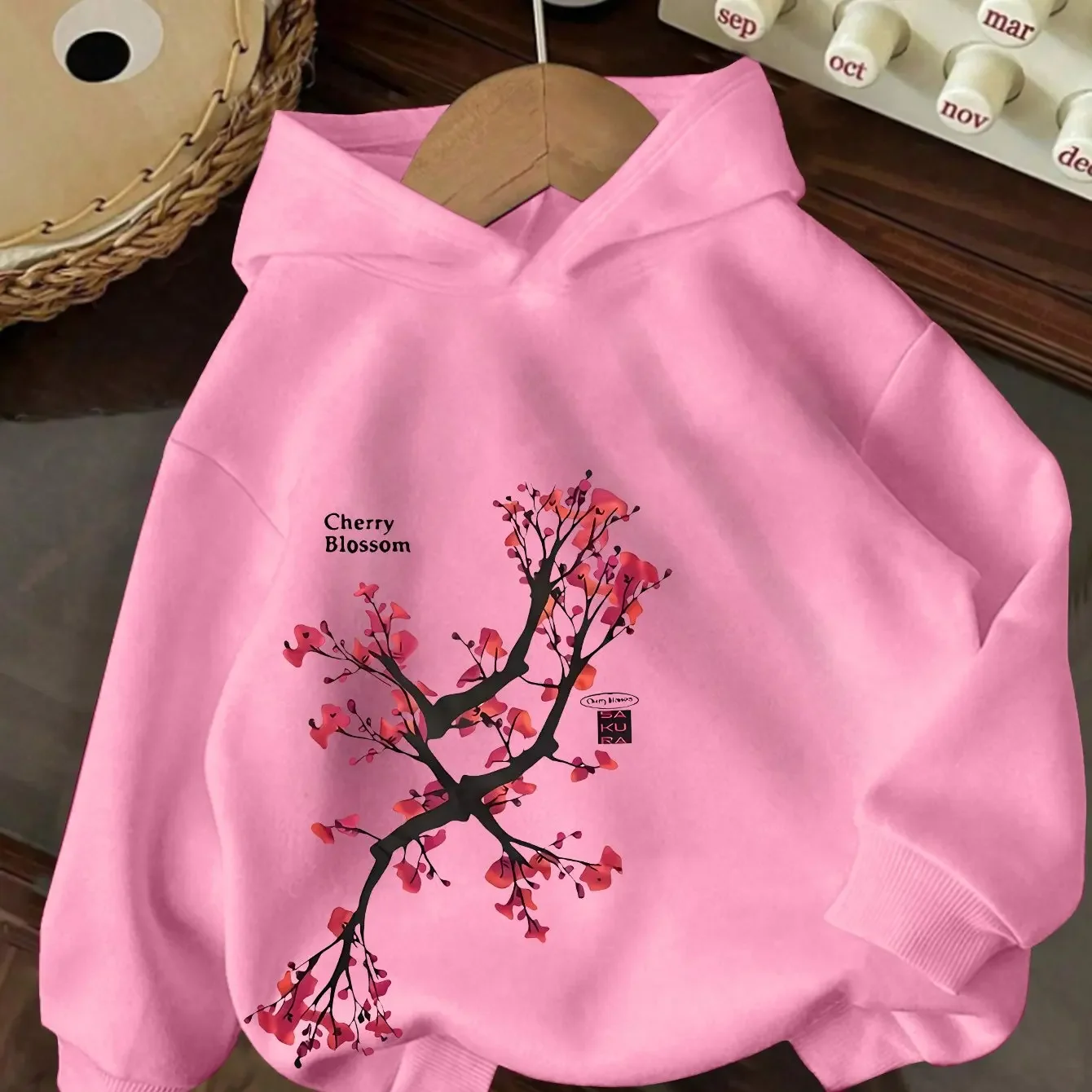 New autumn/winter casual hooded sweatshirt with delicate cherry blossom patternsoft and perfect as aChristmas gift for children.