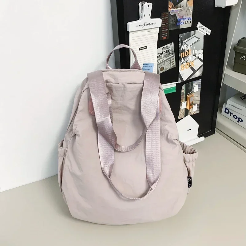 2024 Hot Sale Casual Simple Large Capacity Nylon Backpacks Youth Zipper Solid Color Bags for Unisex Commuting Bolso Mujer