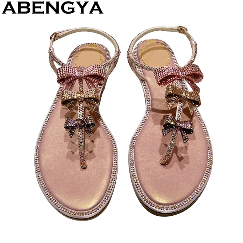 

ABENGYA Classic Hot Sale Flip Flop Flat Sandals Woman Crystal Bow Designer Sandals Summer Casual Beach Shoes zapatillas de mujer
