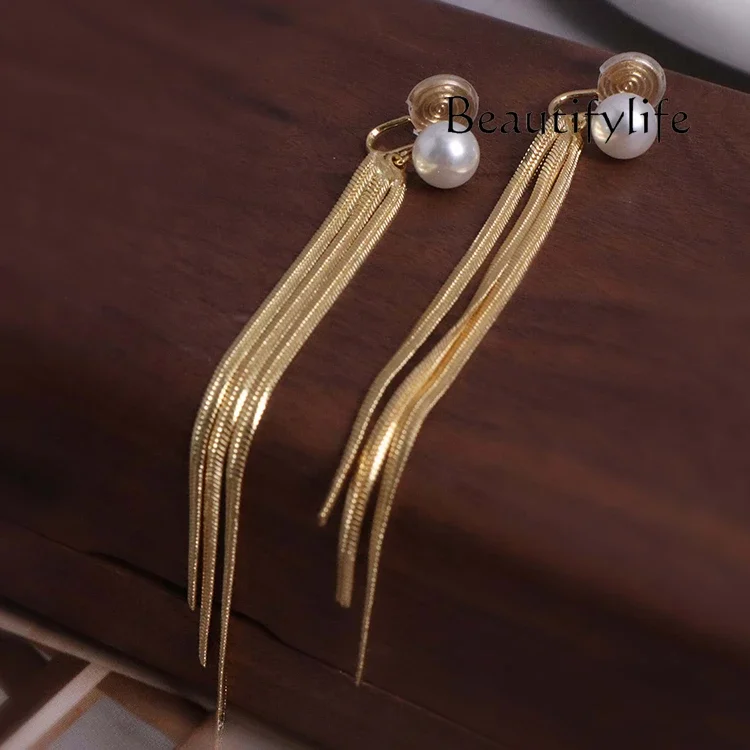 Gold tassel ear clips without ear piercings Femininity French niche high-end earrings Autumn and winter super long