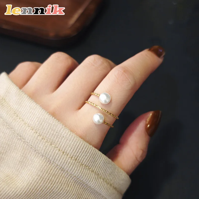 LENNIK Multi Layer Line Pearl Ring, Female Niche Design, Fashionable and High-end Sense, Movable Titanium Steel Gold Ring