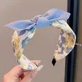4  blue bow flower