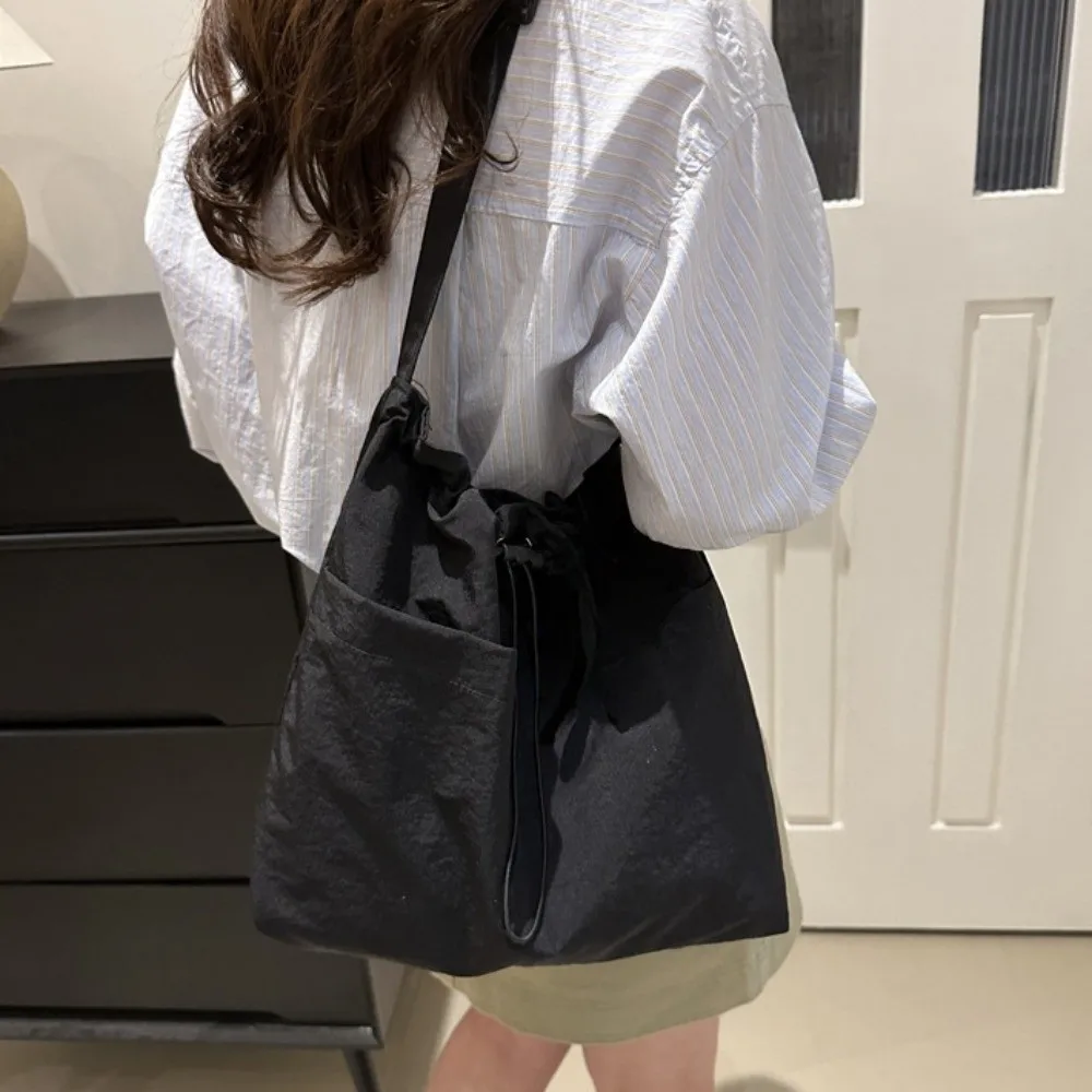 

Fashion Nylon Wrinkle Drawstring Bag Large Capacity Korean Style Crossbody Bag Waterproof Commute Single Shoulder Bag Unisex