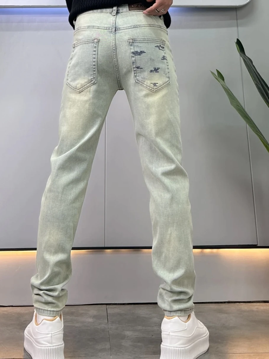 กางเกงยีนส์ผู้ชายสไตล์อเมริกันย้อนยุคทรงสลิมฟิตยืดได้ขาเล็กขายาวแฟชั่นฤดูใบไม้ผลิฤดูใบไม้ร่วงทนทานต่อการสึกหรอสวมใส่สบาย