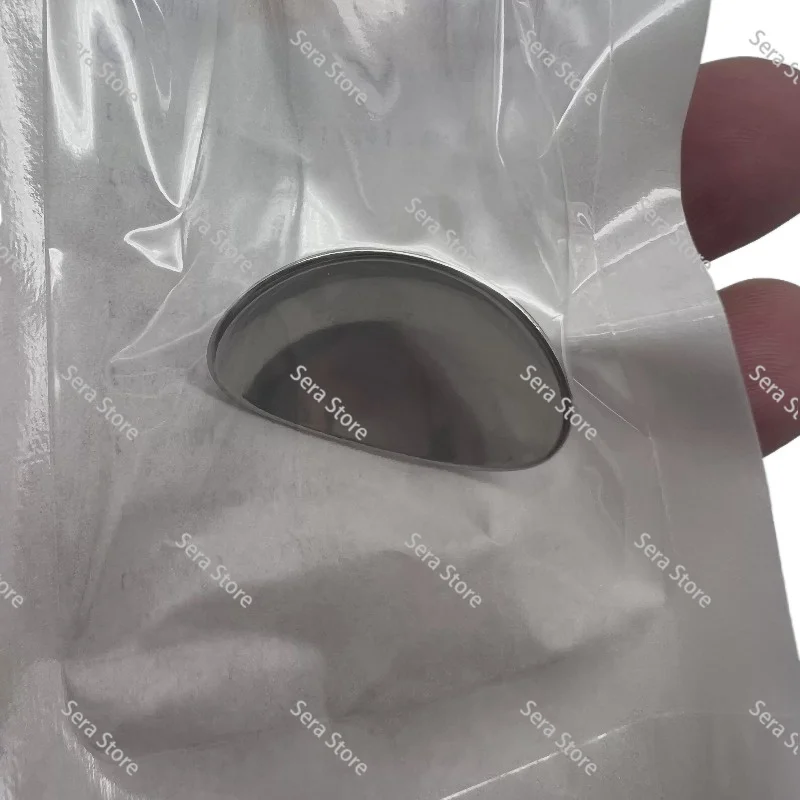 A pair of Manual Source Size-M Beauty Instrument 25 20 mm Laser Eye Shield with Handle
