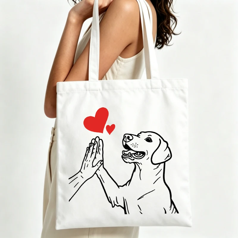 Women's dog and hands graphic canvas tote bag, casual style for daily shopping and outings