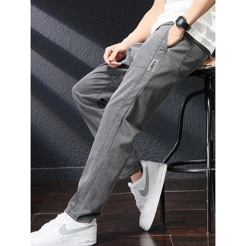 Fashion Spliced Pockets Solid Color Casual Jeans Men's Clothing 2024 Spring Summer New Loose Elastic Lace Up High Waist Trousers