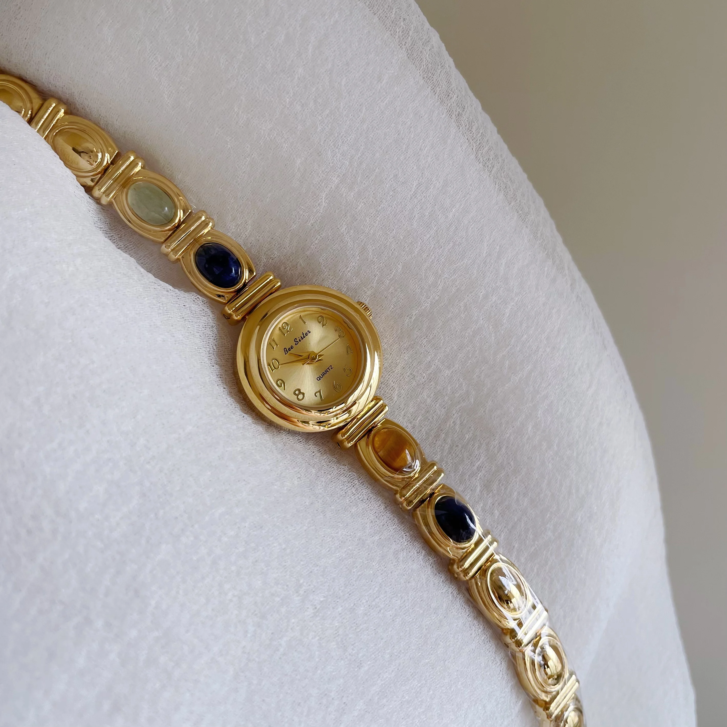 Elegantwomen's wristwatchretro and stylish antique style colorful stone dial small gold watchwomen's bracelet style quartz watch