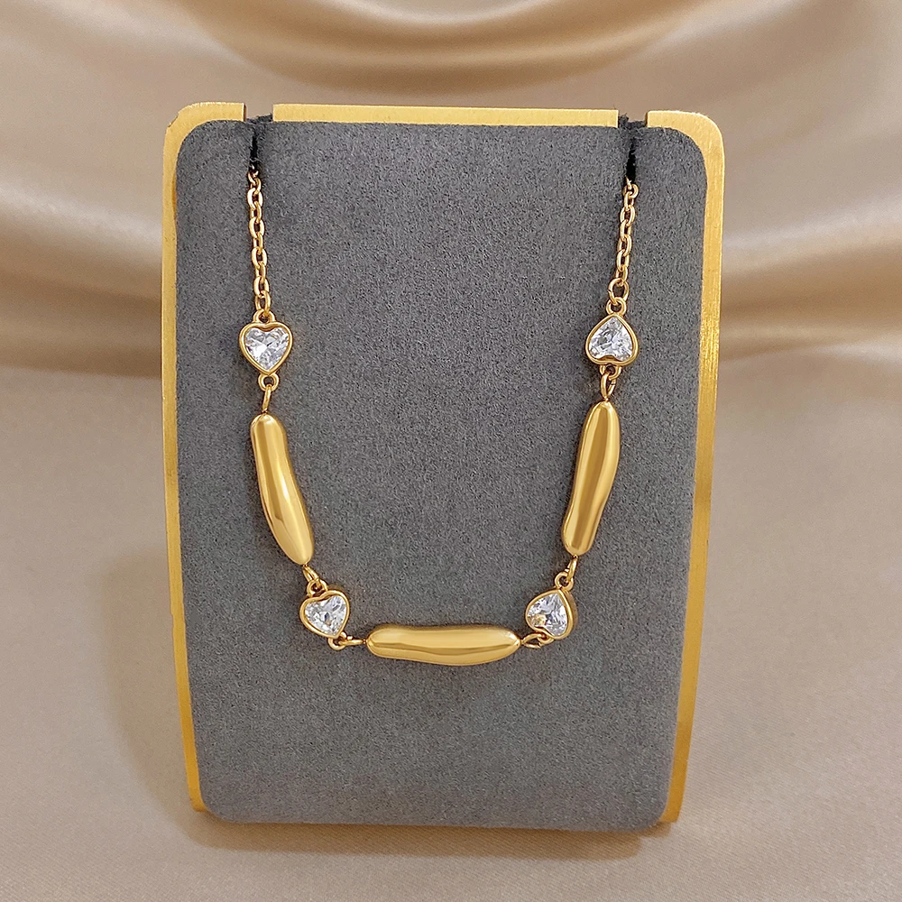 AENSOA Damen Halskette aus Edelstahl in Goldfarbe, lange, zierliche Halskette mit Herz-Zirkon-Verzierung, klassisches Schmuckstück für Partys, Geschenk. – Detail 1