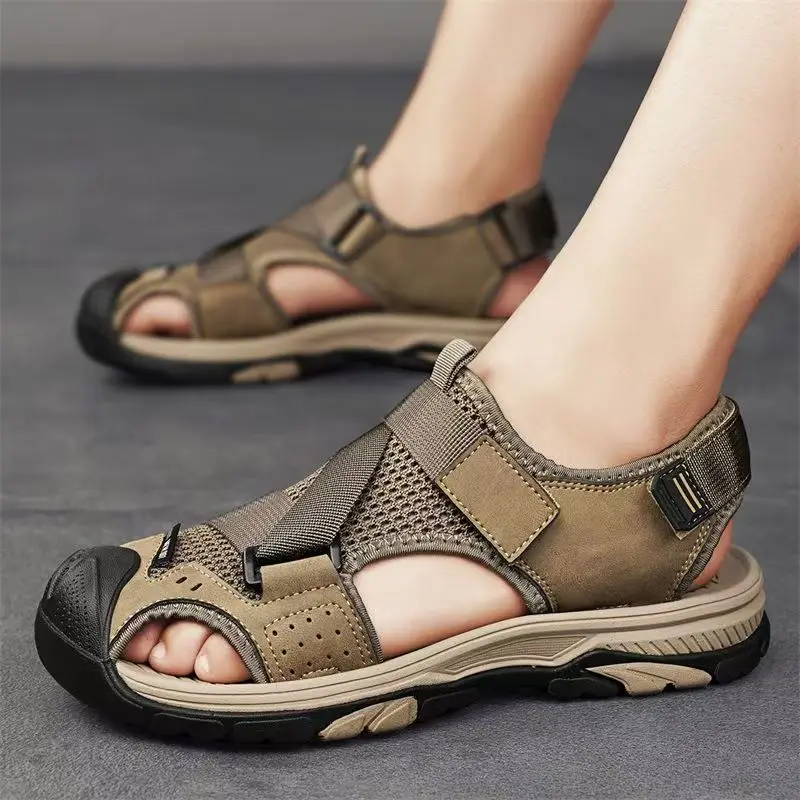 

Men Baotou Hollow Out Big Size Beach Sandals Summer New Soft sole Non Slip Genuine Leather Casual Sports Sandals Wading Shoes
