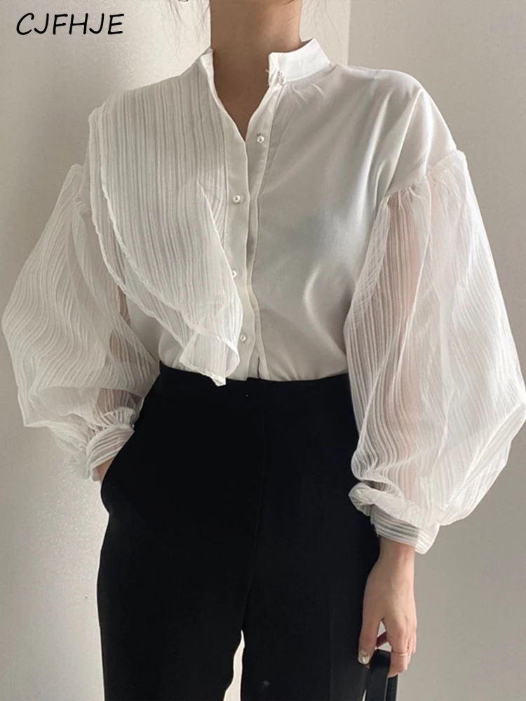 CJFHJE Spring Summer Solid Color Elegant Ladies Versatile Shirt New Korean Fashion Perspective Spliced Mesh Sleeves Women Shirt