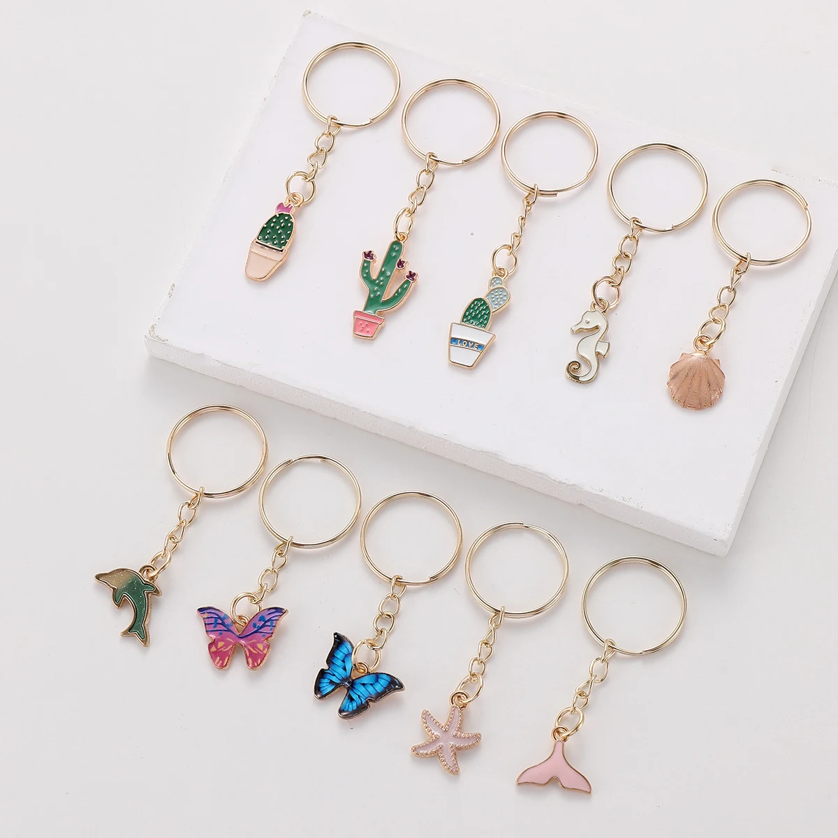 

10pcs butterfly Seahorse Starfish Cactus Keychain Cute Alloy KeyRing Purse Bag Backpack Charm Earbud Case Cover Accessories Gift