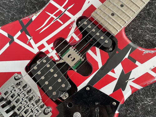 Imagen 2 del producto Guitarra eléctrica con pastilla de puente inclinado trémolo, cabeza larga de plátano, rayas blancas y negras, alta calidad, envío gratis