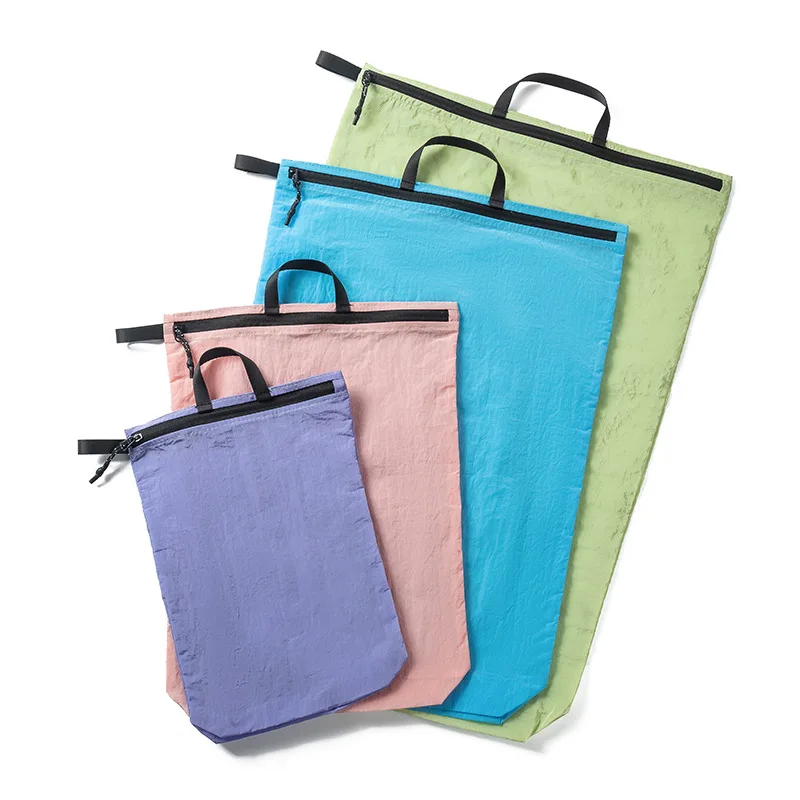 

2026 New Portable Travel Waterproof Storage Bag Outdoor Swimming Dirty Pocket Dry Wet Separation Hand-held Clothing Bag