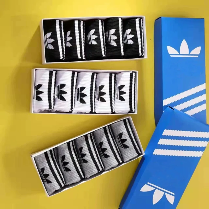 5 paia di calzini sportivi unisex Calzini bianchi a tubo medio da uomo alla moda Calzini da yoga traspiranti in cotone tinta unita Calzini classici per coppia