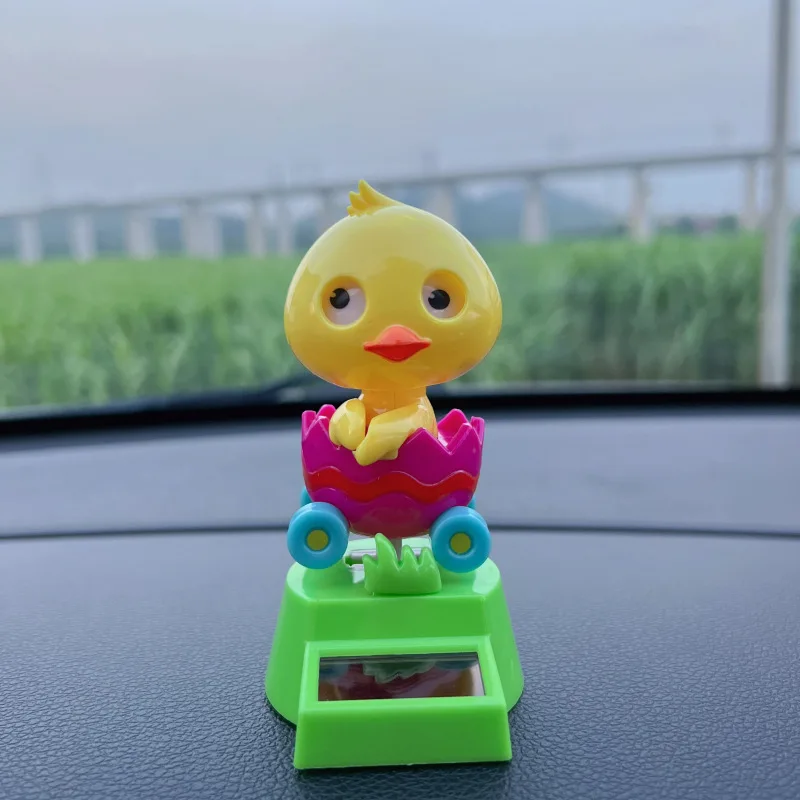 Energia solar dos desenhos animados animal balanço dança brinquedo bonito sapo pato auto dança brinquedo solar console central do carro ornamento decoração presente engraçado
